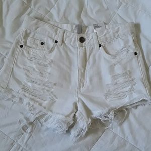 White ripped divided H&M shorts
